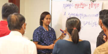 Group of people discussing about how they can contribute to raising awareness about hepatitis b and c